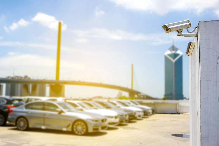 Security camera in parking lot Stock Photo - Alamy
